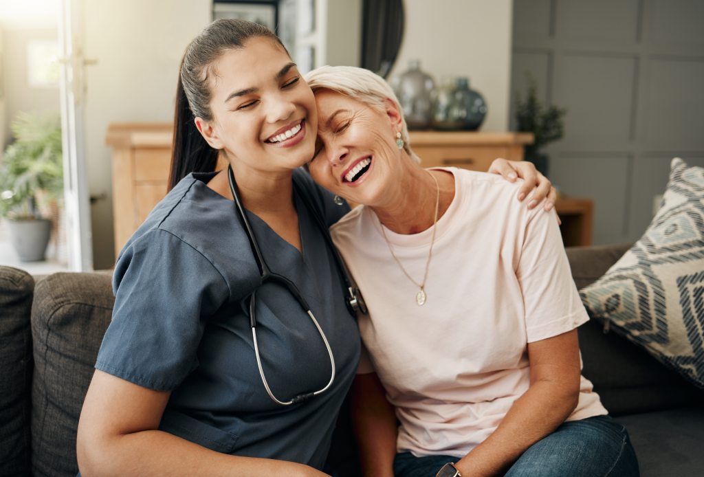 A case manager, who helps with home care for the elderly in Michigan, with a patient.