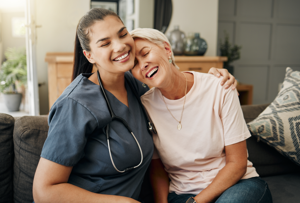 A hospital case manager with a patient continuing the Wellspring tradition of patient advocacy.