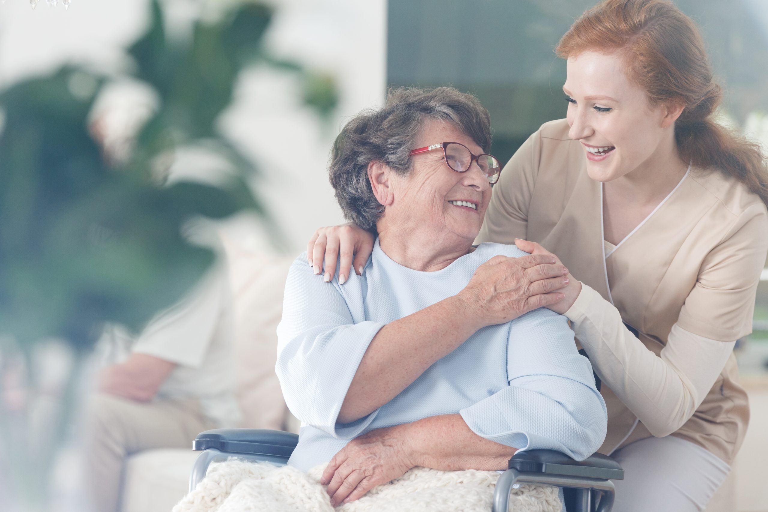 A nurse with a patient who needs long term health care.